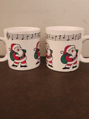 Set of 2 Vintage Christmas Mugs features a novelty design and a round shape
